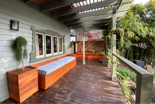 Outdoor deck with Bloom Box Products timber furniture and planter boxes